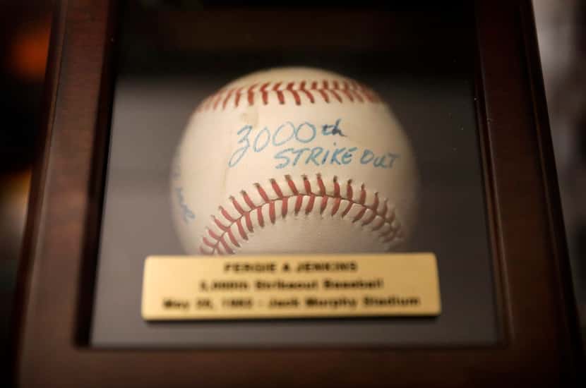 Former Texas Rangers and Chicago Cubs pitcher Ferguson Jenkins kept the ball from his...