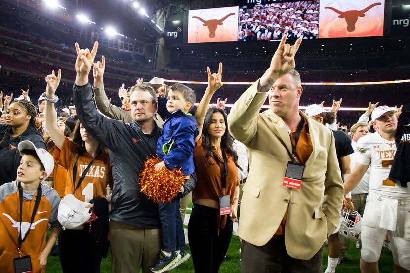 Texas head coach Tom Herman celebrates after a win over Missouri in the Texas Bowl on...