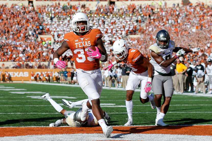 Texas running back D'Onta Foreman (33) score a touchdown against Baylor during the second...