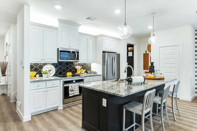 Two- and three-bedroom luxury townhomes are selling quickly at Woodbridge Townhomes, a new...