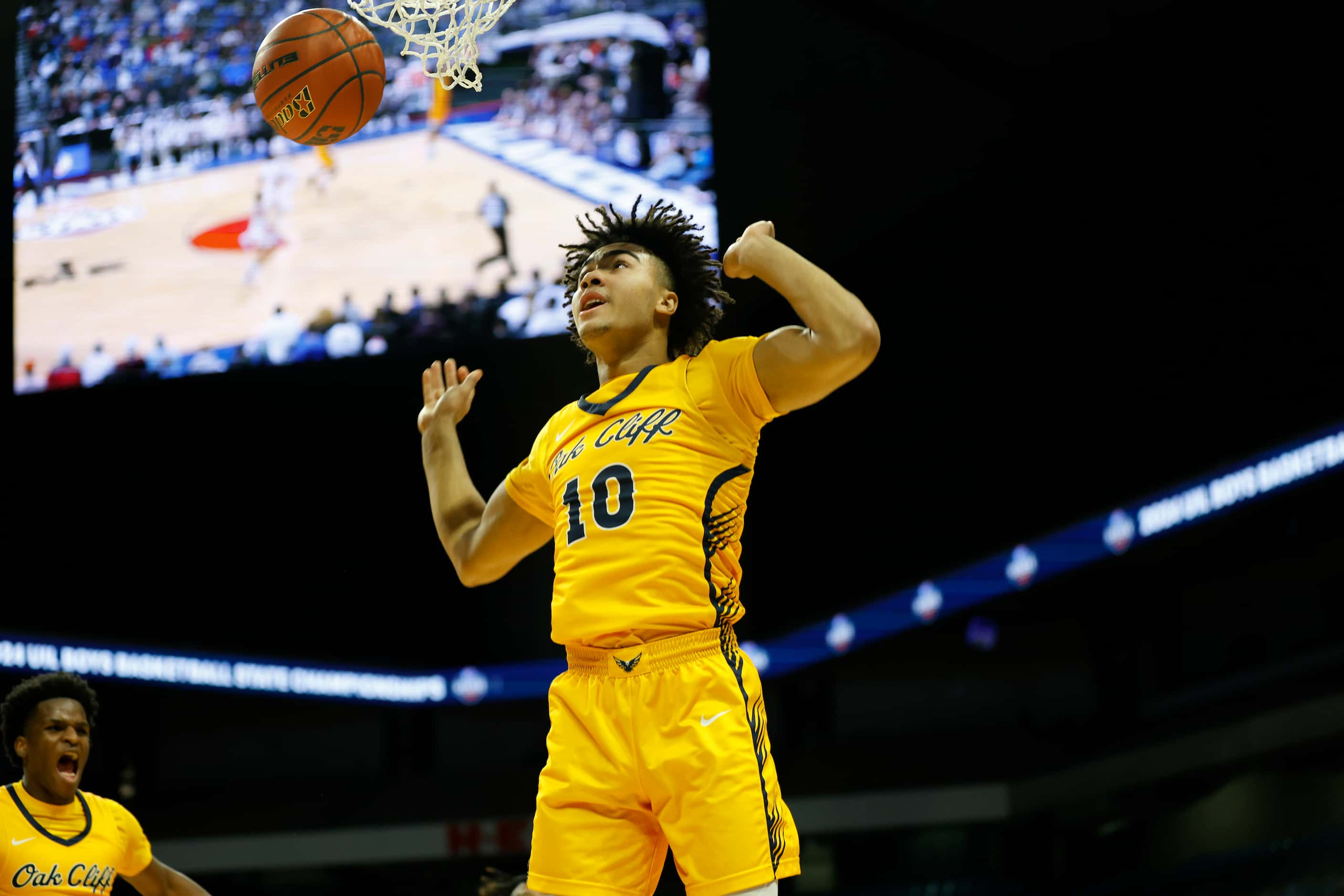 Oak Cliff Faith Family Academy Isaac Williams (10) dunks in the first half. Class 4A boys...