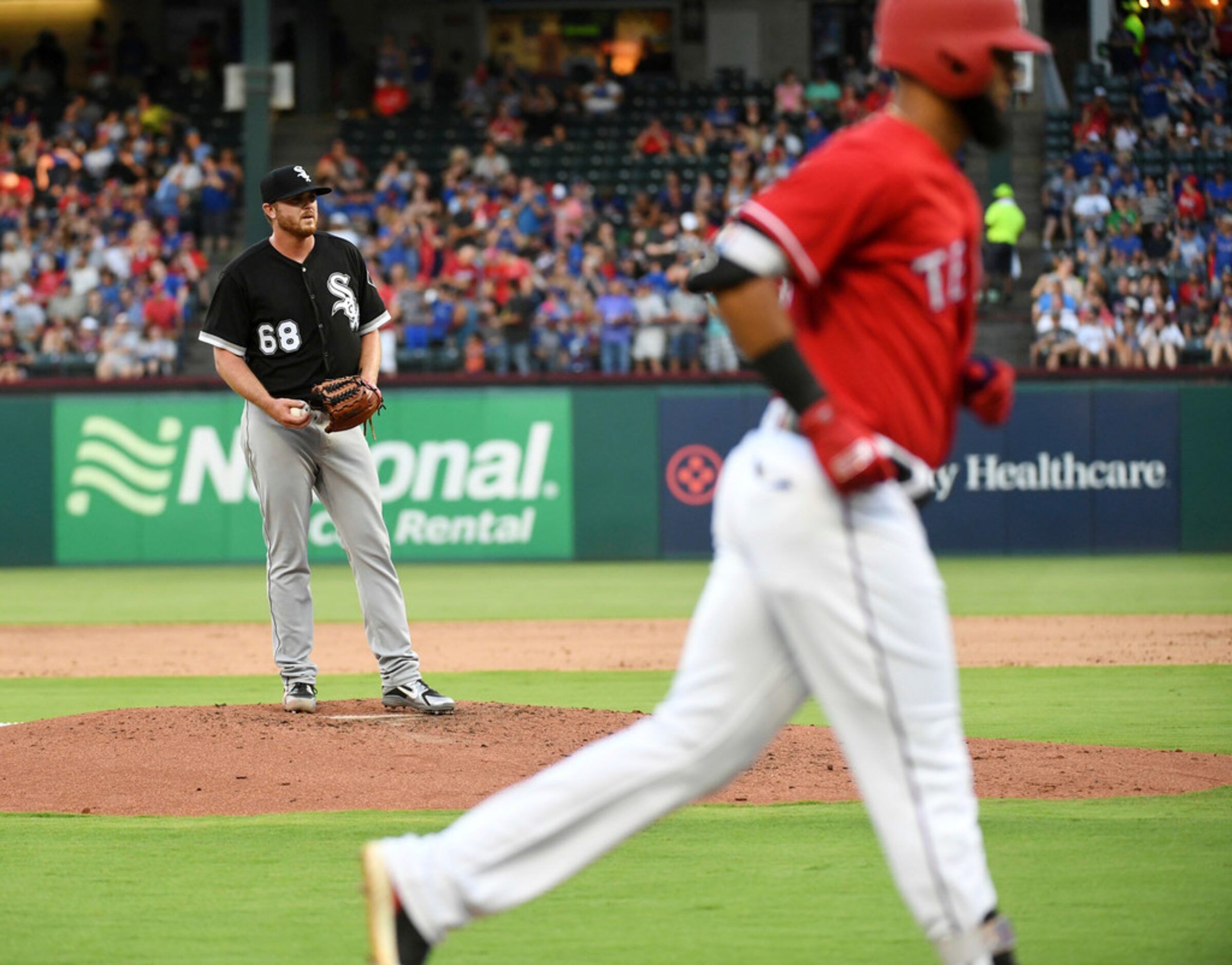 Chicago White Sox starting pitcher Dylan Covey (68) stands on the mound after giving up his...