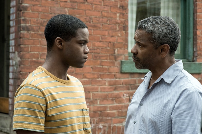 Jovan Adepo, left, and Denzel Washington in a scene from "Fences."