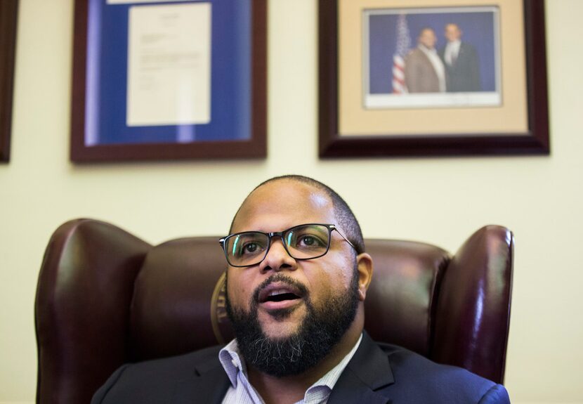 State Representative Eric Johnson of Dallas, speaks to members of the media after the State...