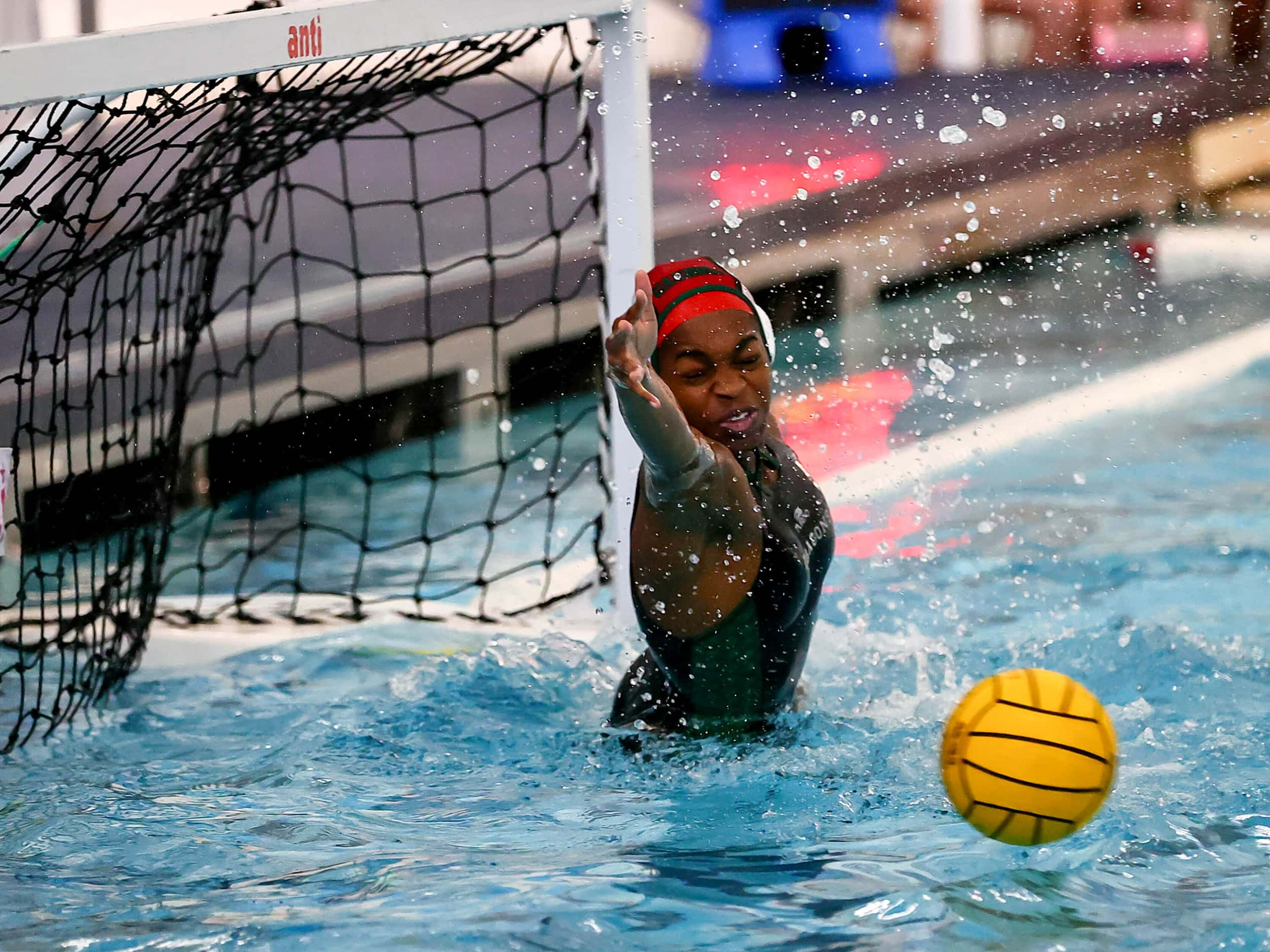 Southlake Carroll goal keeper Somto Okafo tries to make a save against Hebron in the 6A...