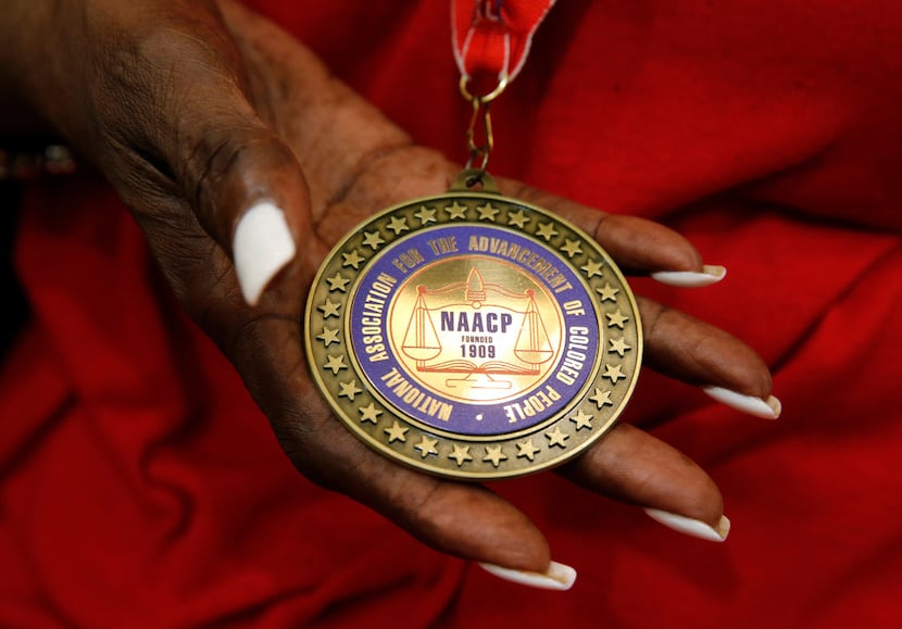 Detail of a medal Daisy Garner received from the NAACP for her husband Willie B. Ludden Jr....