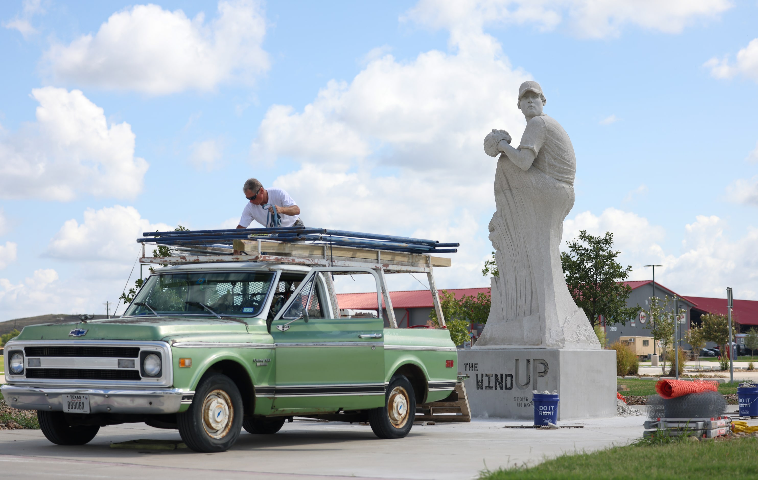 Robert Jacob Dobscha packs up his materials after working on the first of several “Stone in...