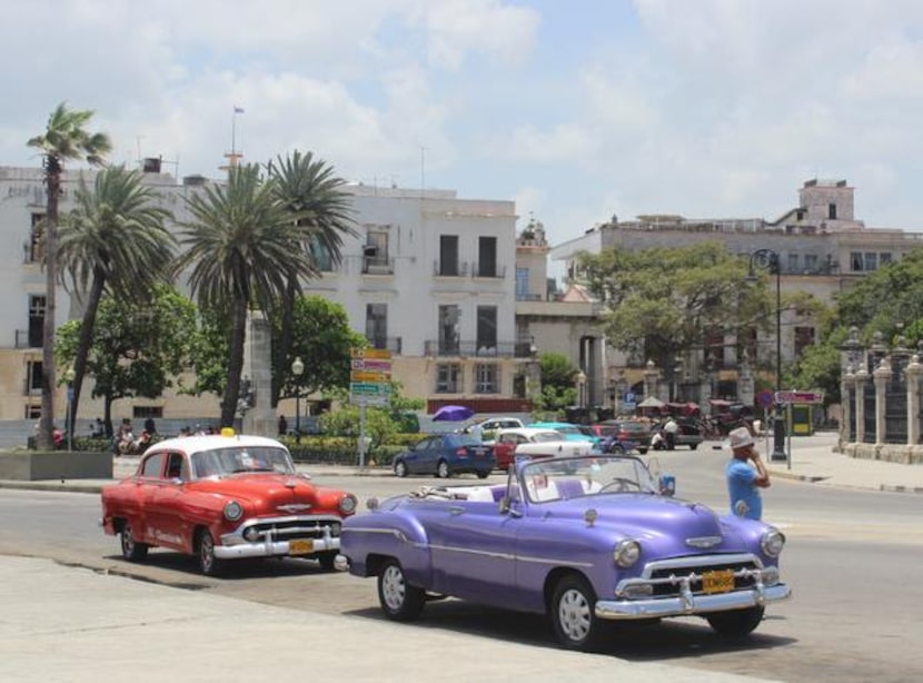 
The beloved Cuban taxis -- American cars, many gorgeously restored, from the 1950s, before...