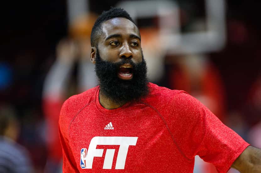 Jan 28, 2015; Houston, TX, USA; Houston Rockets guard James Harden (13) warms up before a...