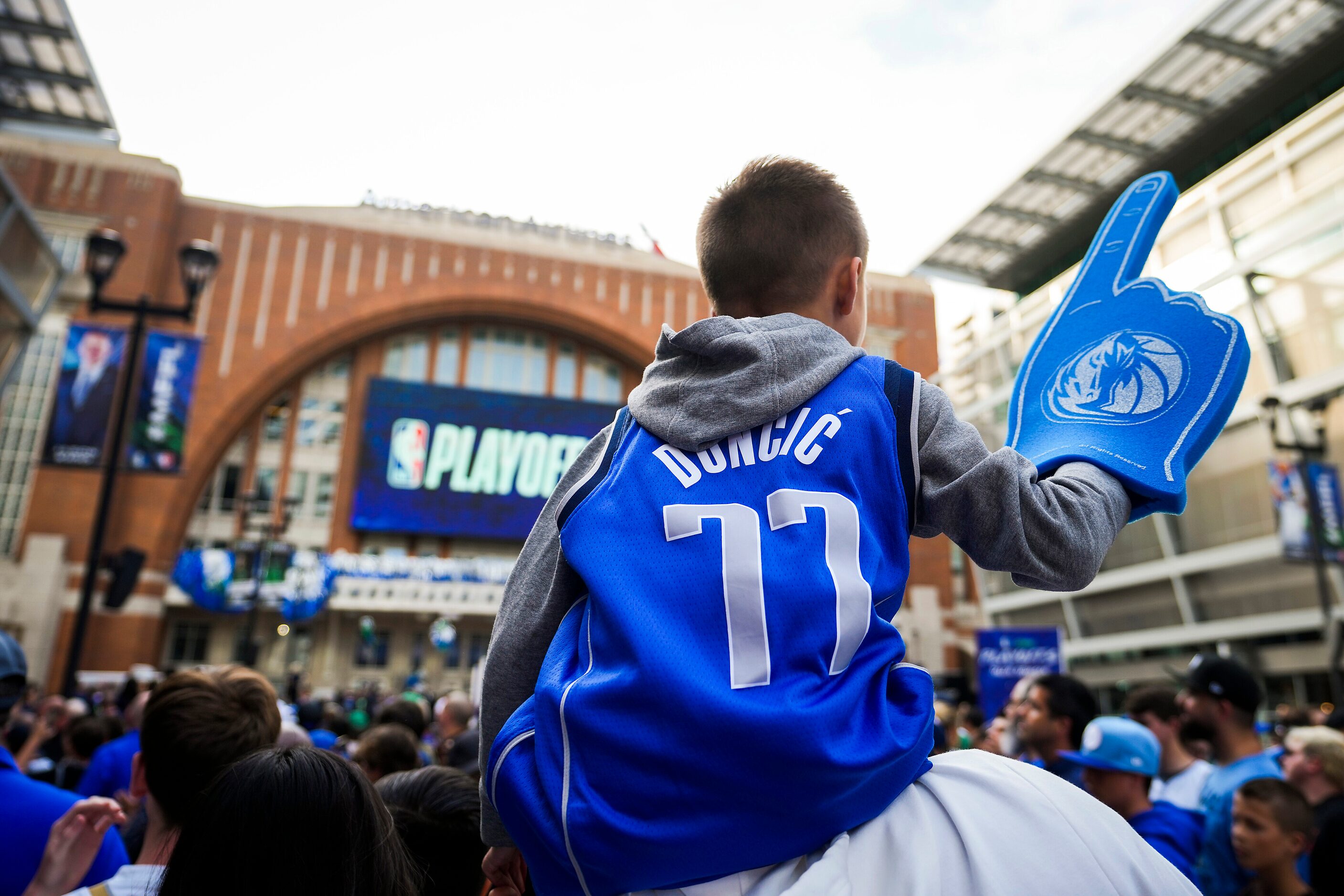 Dallas Mavericks fans wait to enter the arena before Game 3 of the NBA Western Conference...