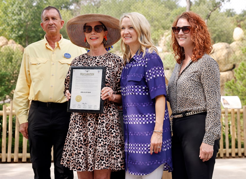 (From left) Fort Worth Zoo executive director Mike Fouraker, Chair of the Fort Worth...