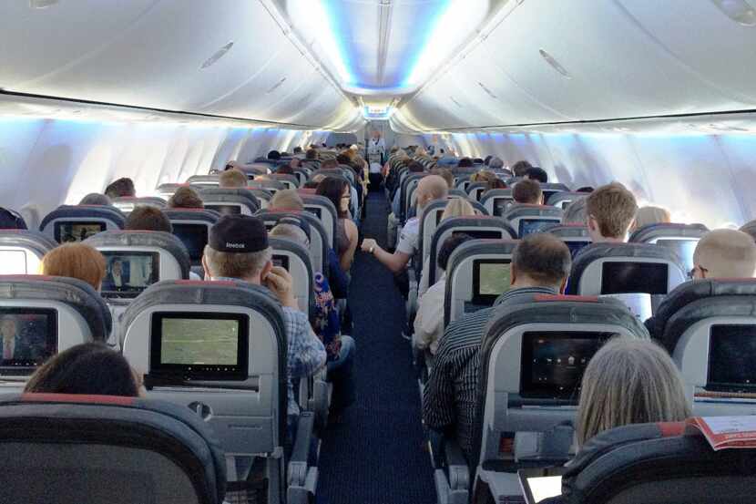 Passenger onboard an American Airlines' new 737s. The cabin gives standard economy...