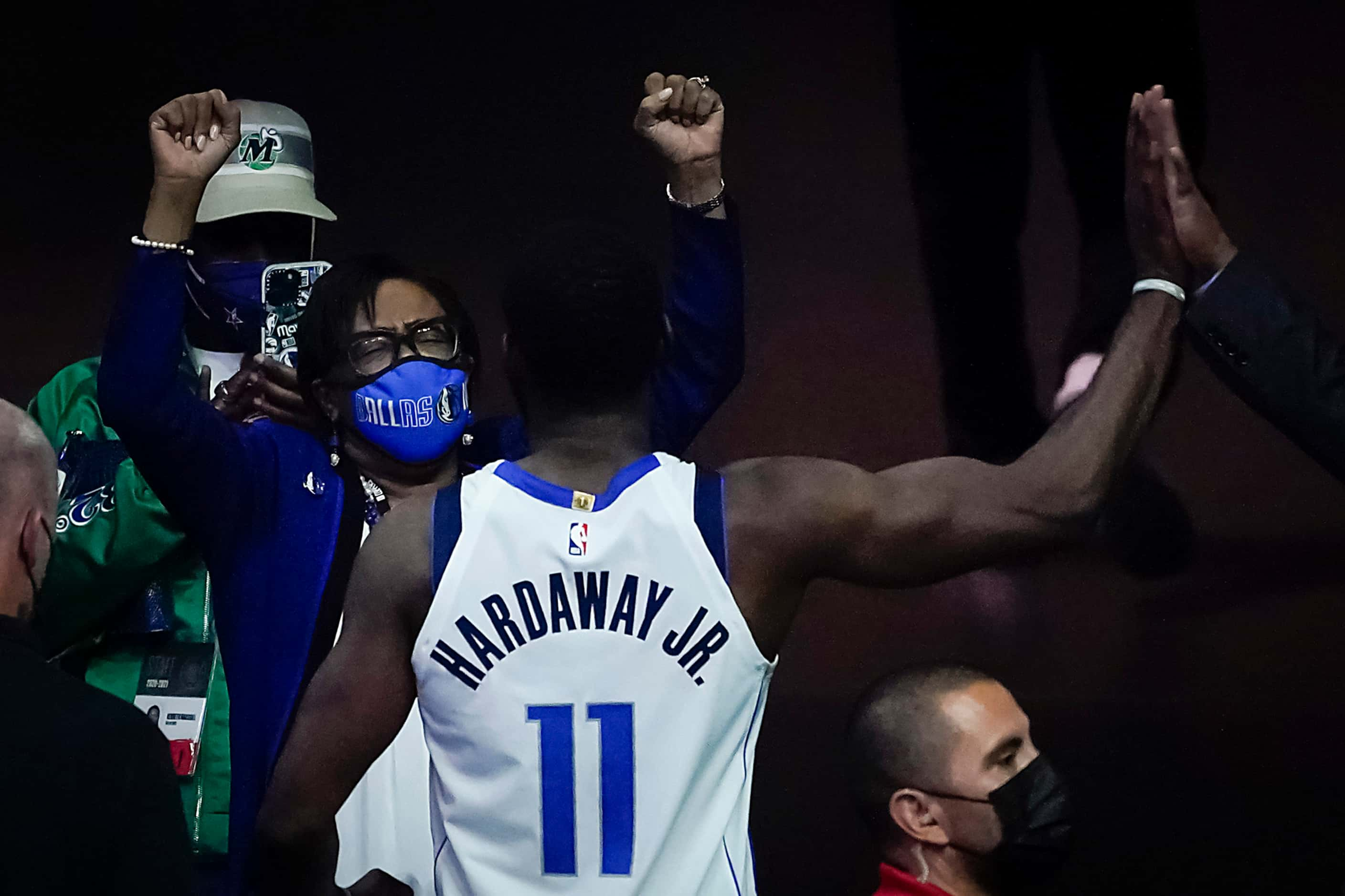 Dallas Mavericks chief executive officer Cynt Marshall celebrates as forward Tim Hardaway...