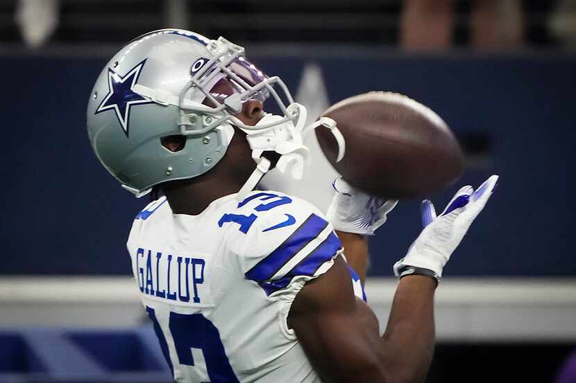 Dallas Cowboys wide receiver Michael Gallup warms up before an NFL football game against the...
