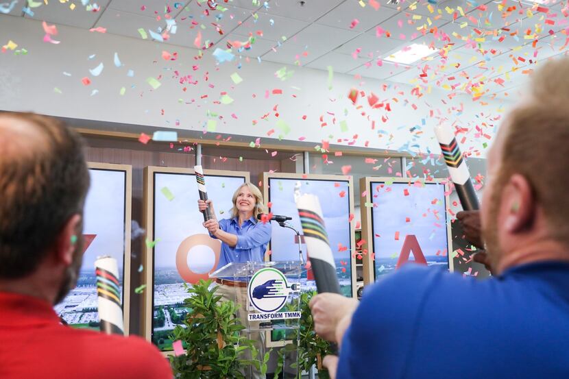 Toyota Kentucky president Susan Elkington celebrates with employees after announcing the...