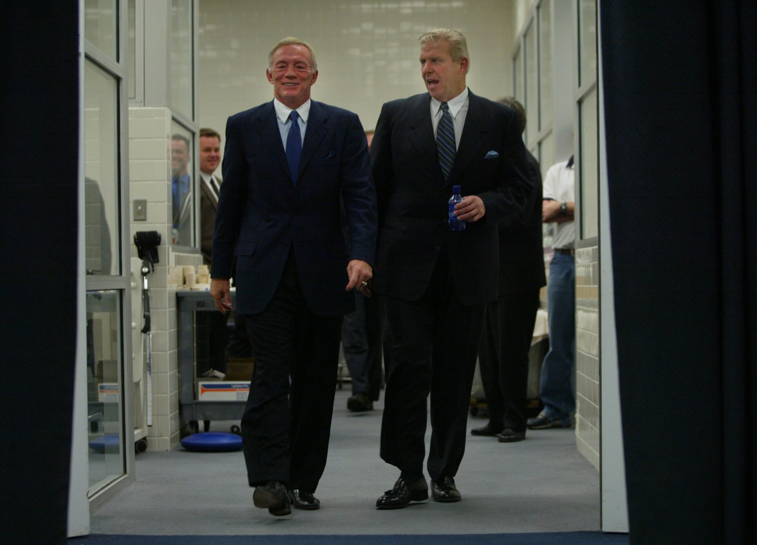 Cowboys owner Jerry Jones and new head coach Bill Parcells walk into the locker room at...