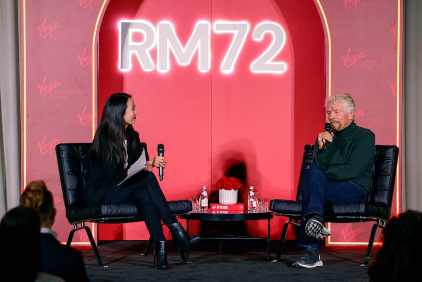 Richard Branson speaks with moderator Liz Tsai during an RM72 event at Virgin Hotel Dallas...