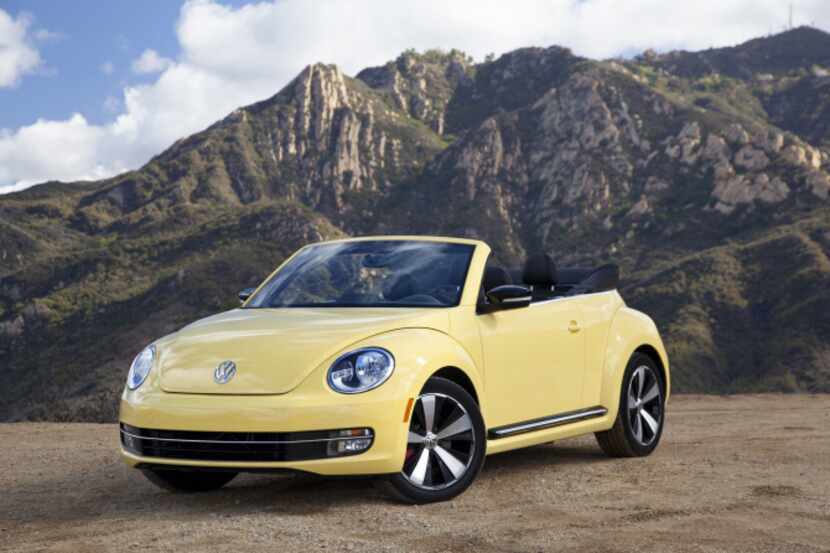 The 2013 Volkswagen Beetle Turbo convertible is a car we could park in the front yard and...