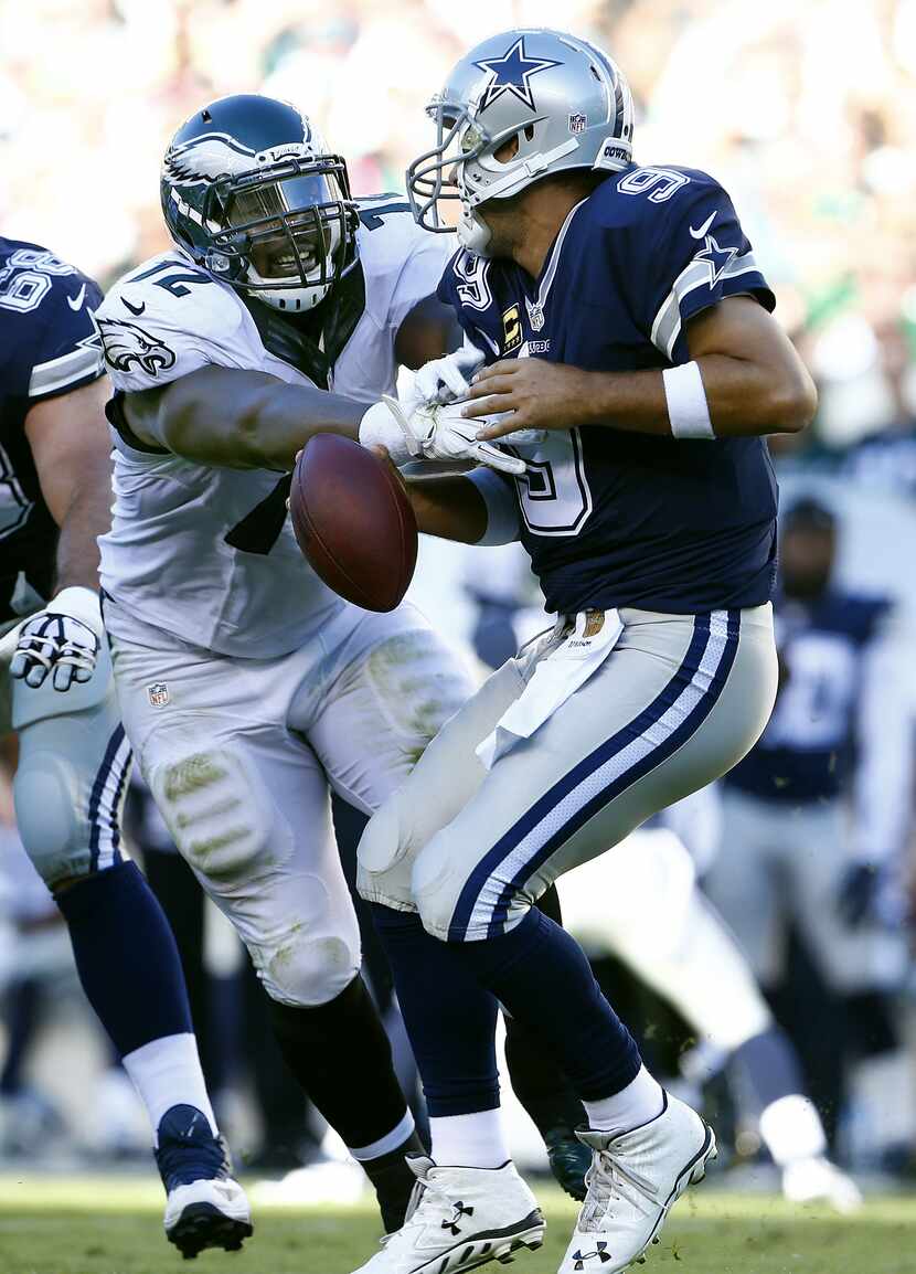  Quarterback Tony Romo #9 of the Dallas Cowboys is sacked by Cedric Thornton #72 of the...