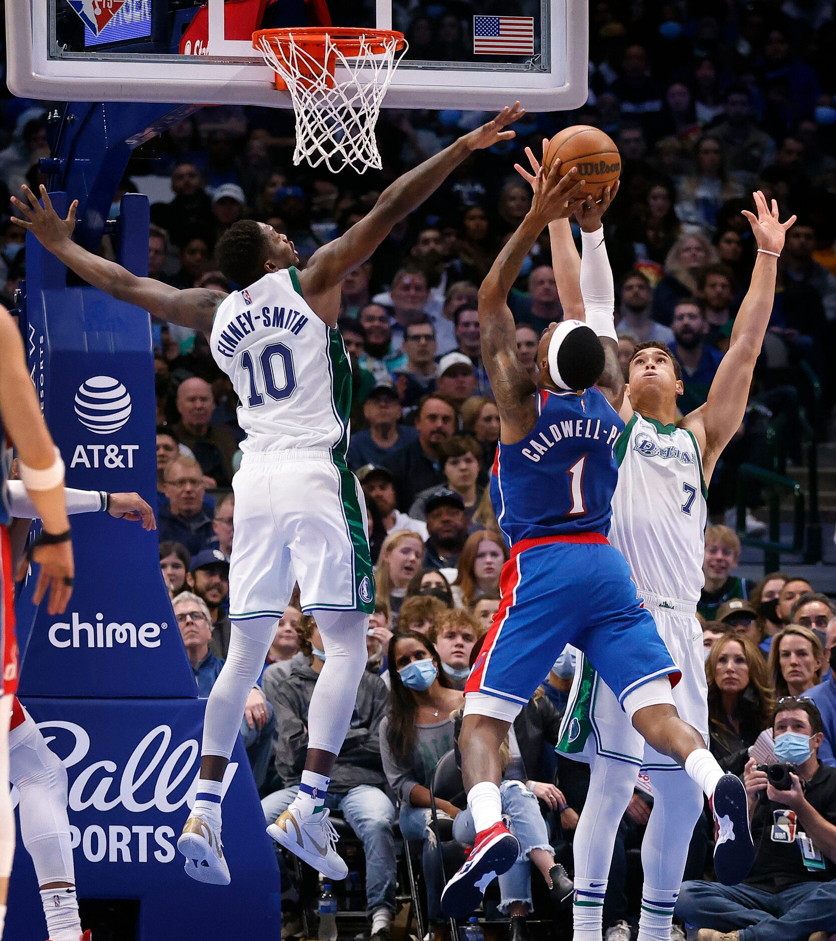 Dallas Mavericks forward Dorian Finney-Smith (10) and Dallas Mavericks center Dwight Powell...