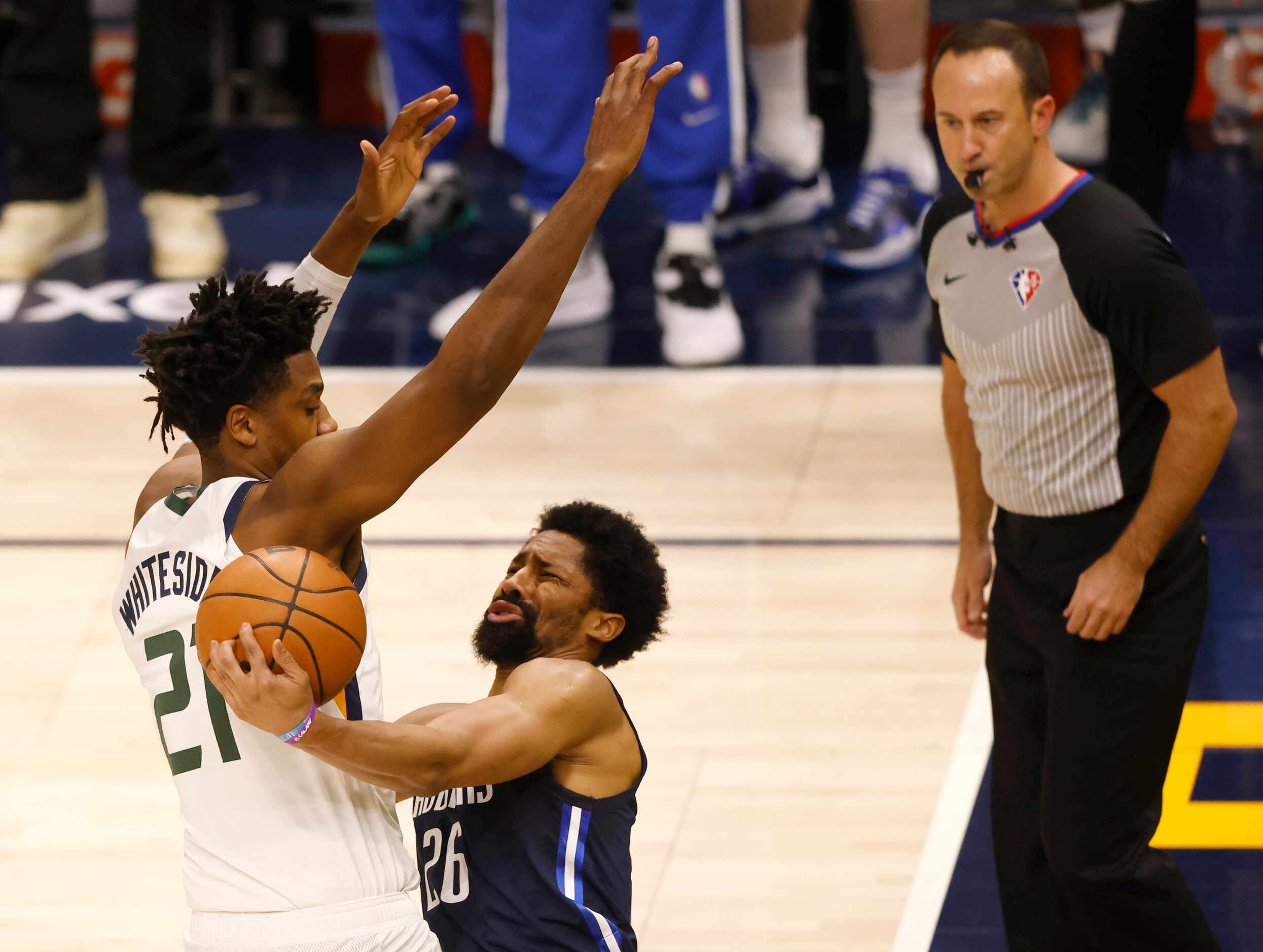 Dallas Mavericks guard Spencer Dinwiddie (26) is fouled by Utah Jazz center Hassan Whiteside...