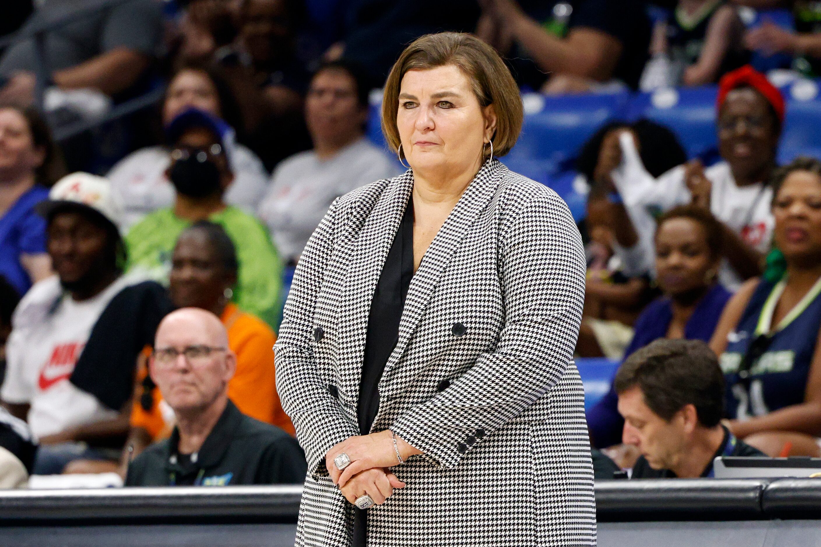 Dallas Wings head coach Latricia Trammell watches the closing seconds of a WNBA first-round...