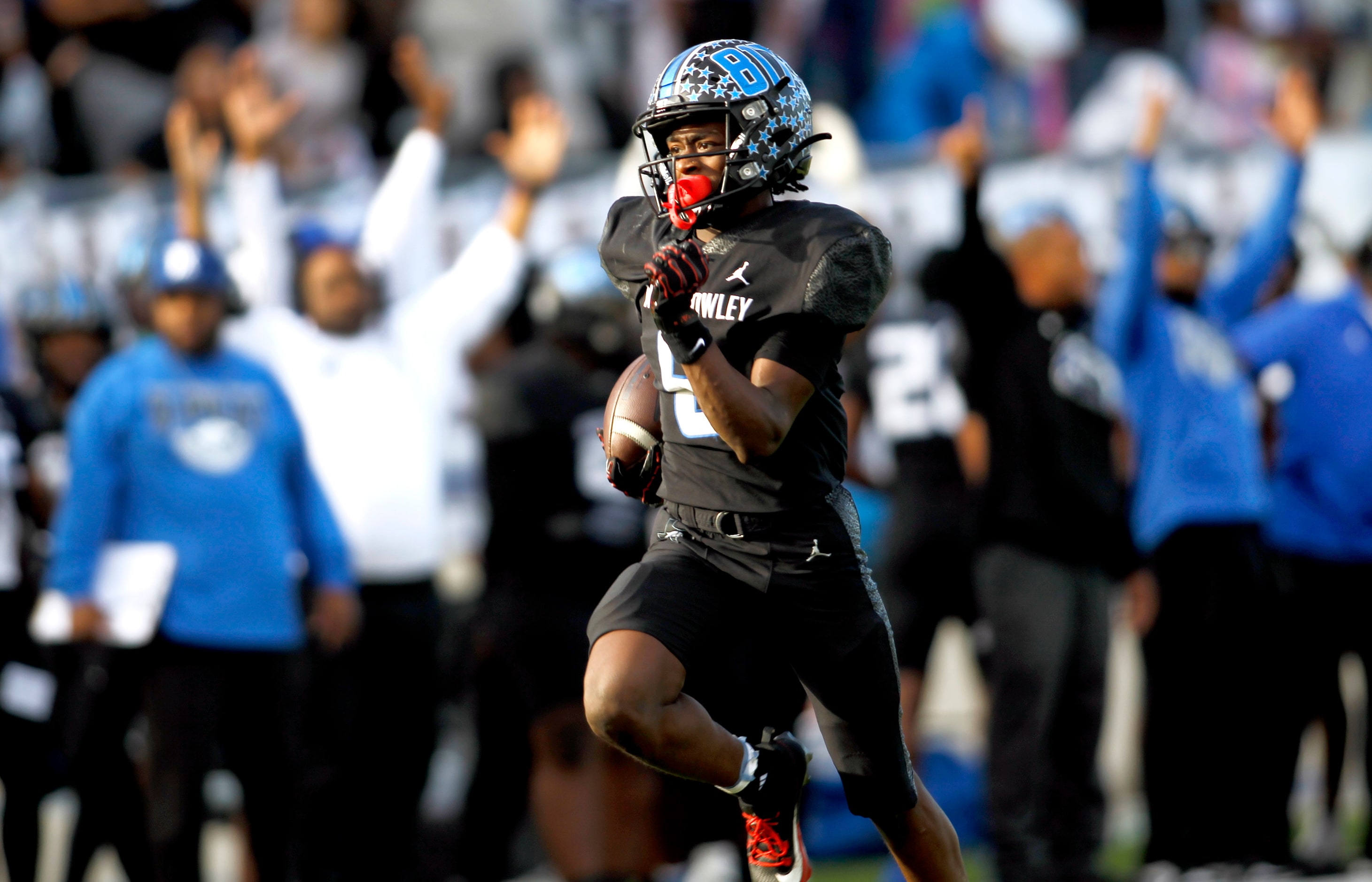 North Crowley receiver Quentin Gibson (6) sprints to the end zone for a long receiving...