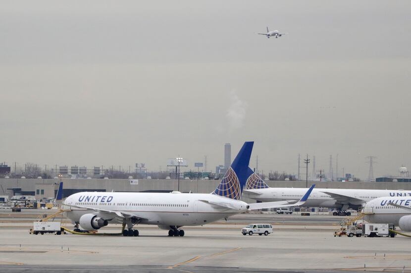 In this Wednesday, Jan. 23, 2019 file photo, United Airlines jets are seen as a plane...