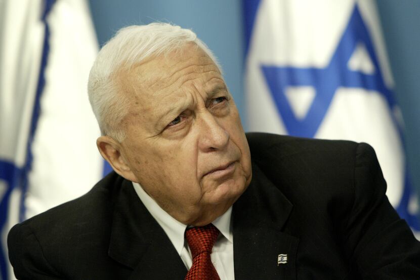 FILE - In this Sunday May 16, 2004 file photo, Israeli Prime Minister Ariel Sharon pauses...