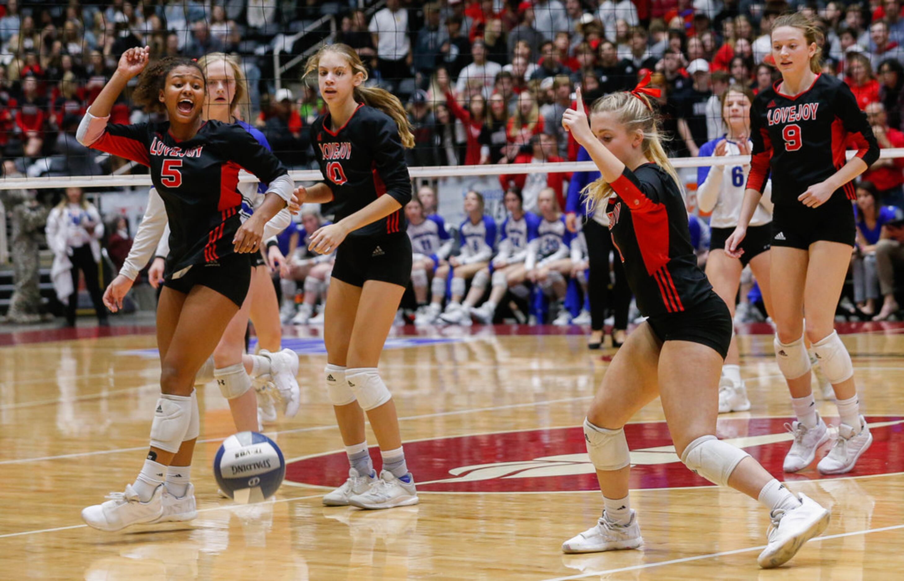 The Lovejoy Leopards call a ball out of bounds during the fourth and final set of a class 5A...