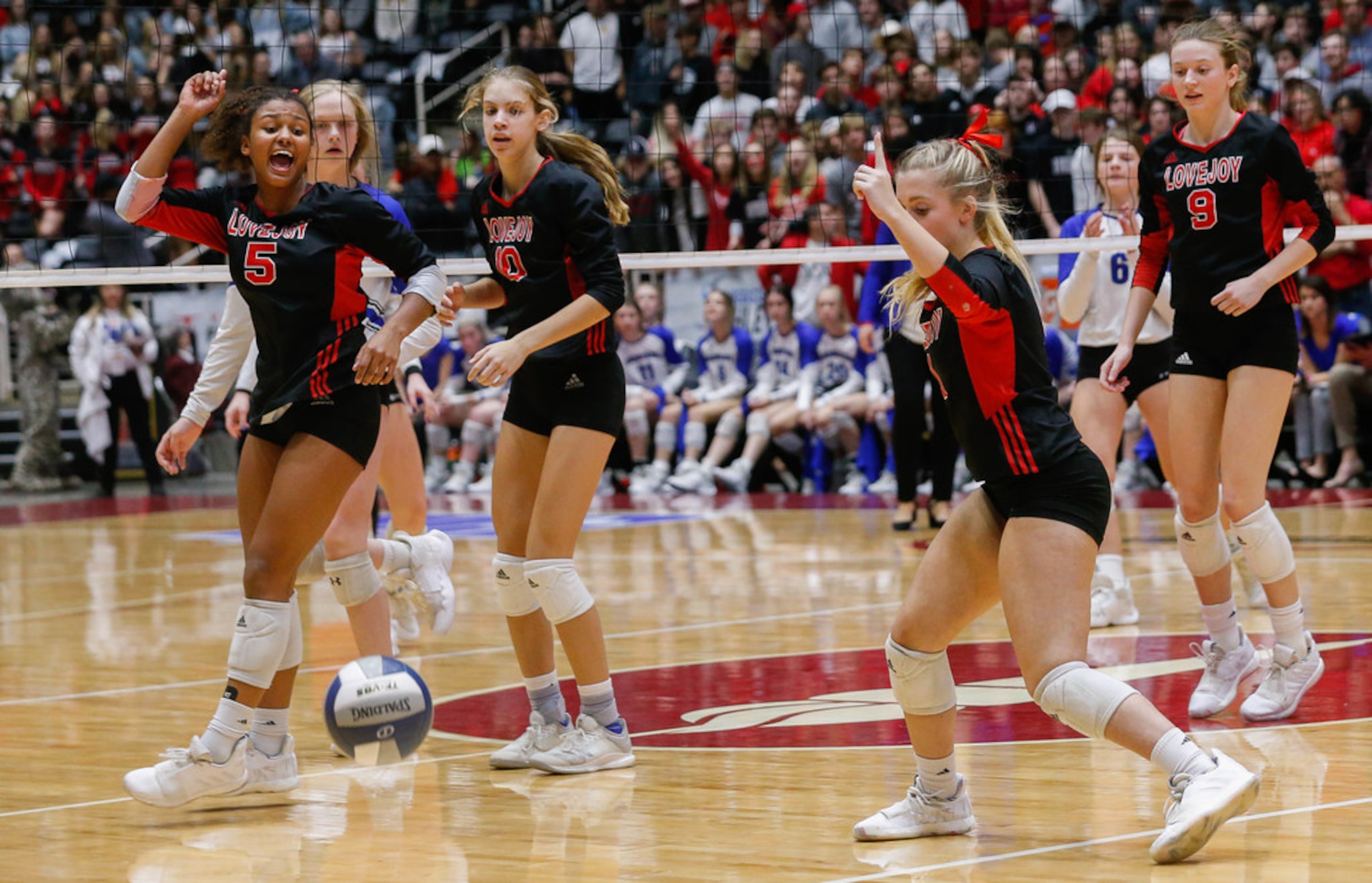 The Lovejoy Leopards call a ball out of bounds during the fourth and final set of a class 5A...