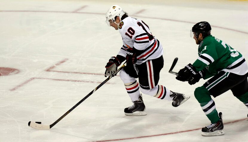 Chicago Blackhawks left wing Patrick Sharp (10) breaks away from Dallas Stars defenseman...