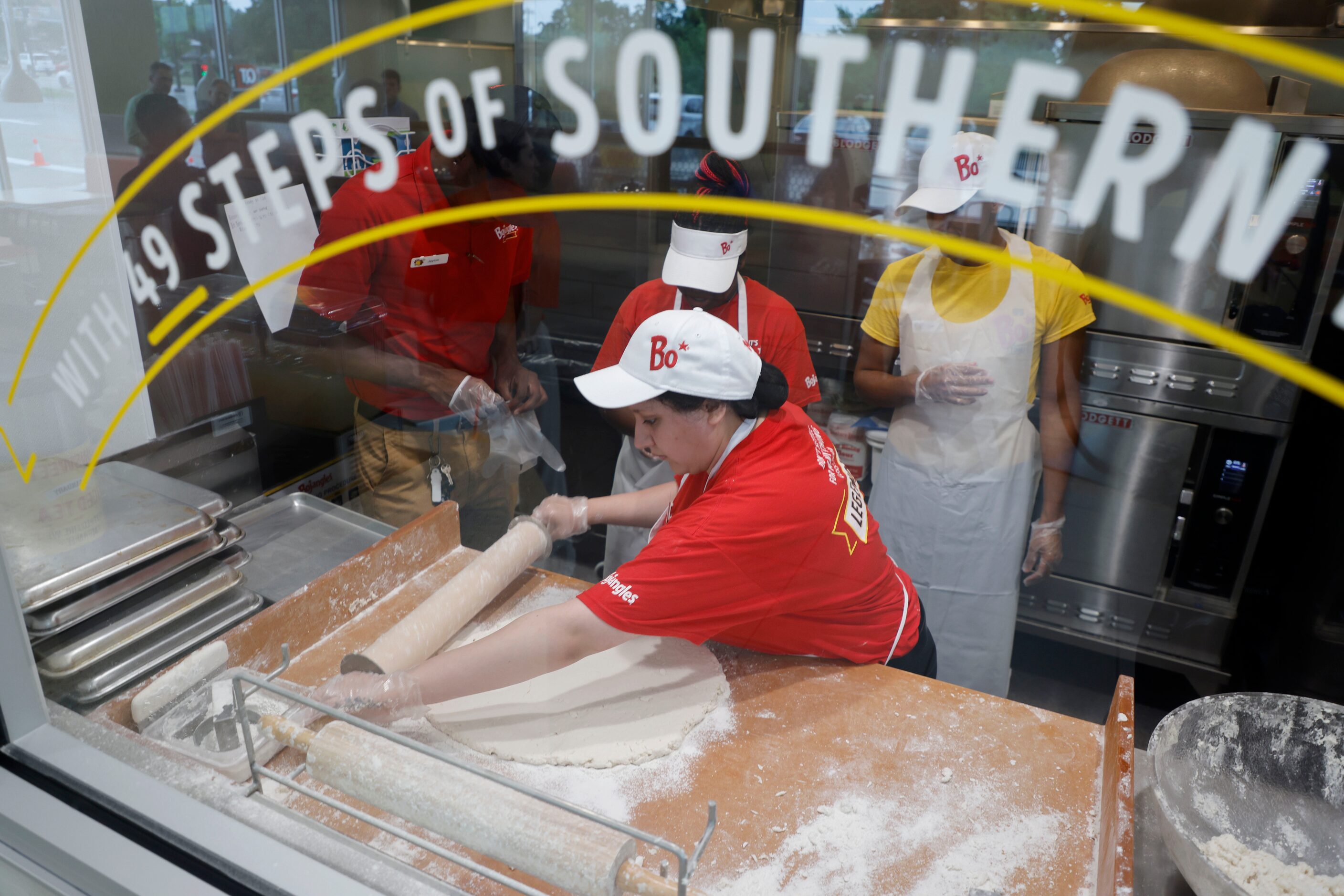 Customers can watch biscuits being made in the "biscuit theater" at Bojangles in Euless.
