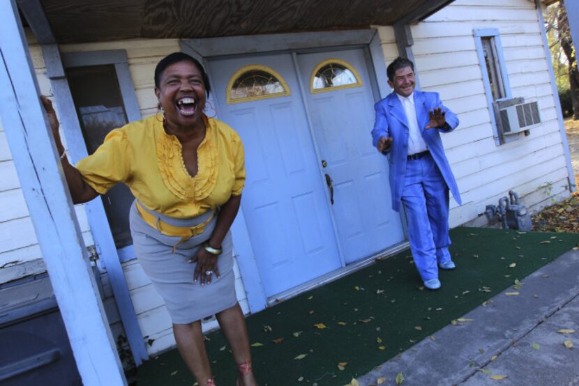 Sister Brenda Shanks, left, and Prophet Pedro Reyes, right, share a lighter moment between...