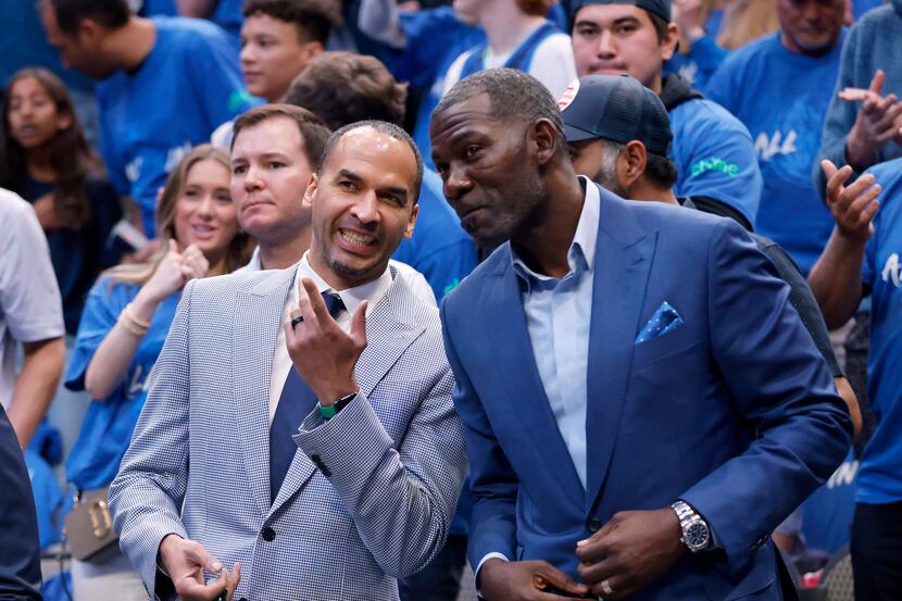 Dallas Mavericks president of basketball operations and general manager Nico Harrison (left)...