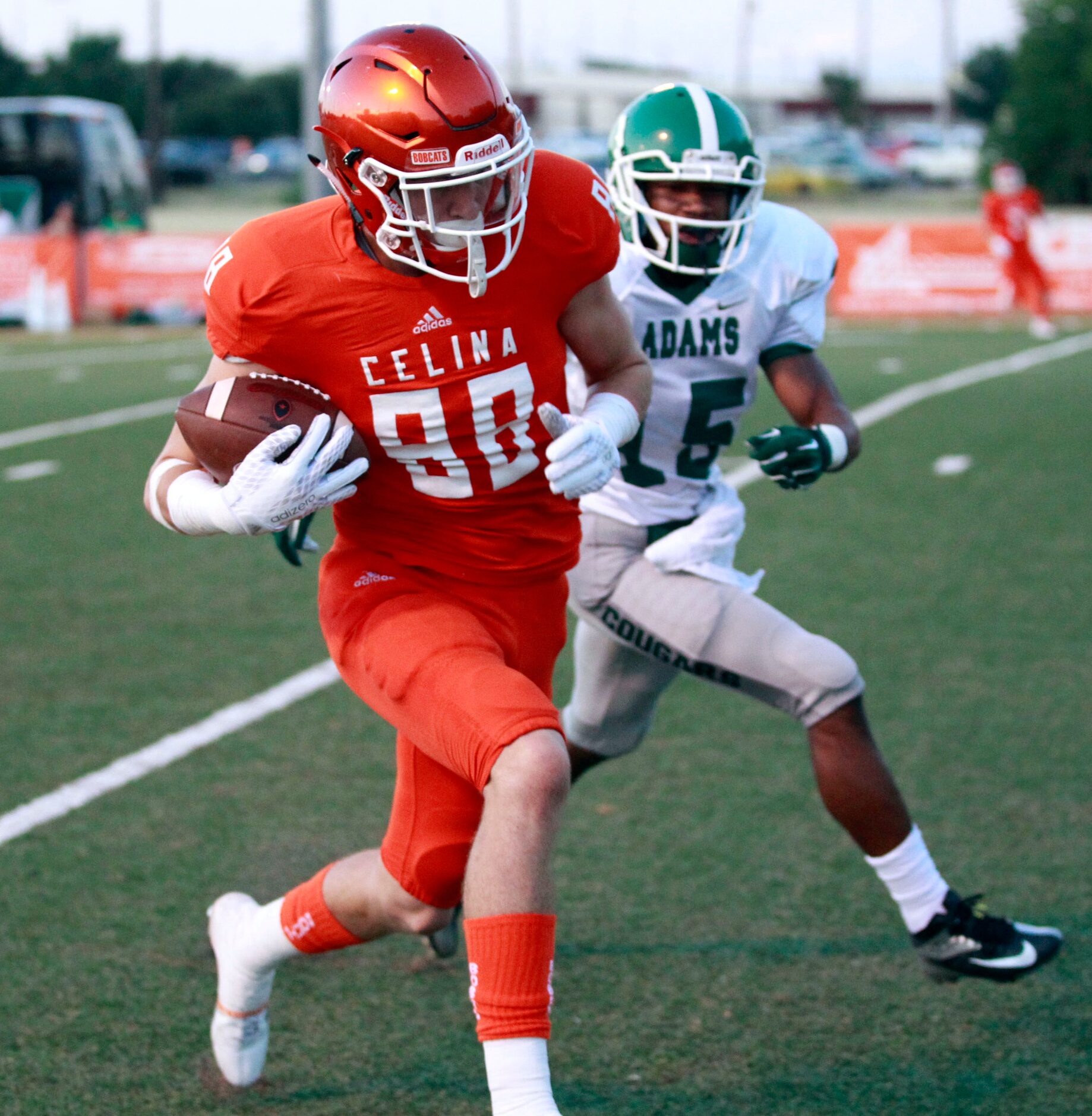 (TXHSFB) Celina High Rilet Nebecker (88) advances a pass to to the end zone for a touchdown...