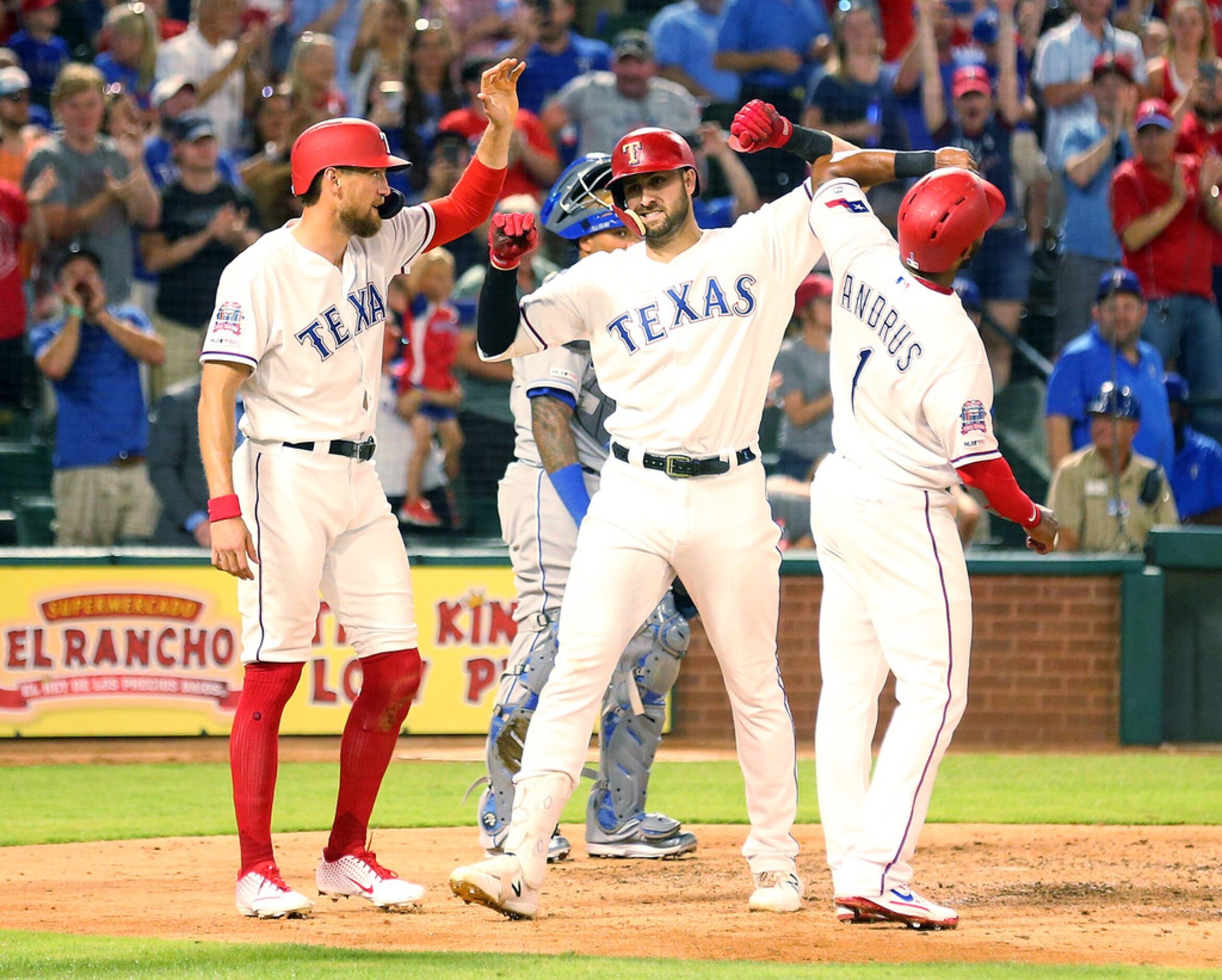 ARLINGTON, TEXAS - MAY 31: Hunter Pence #24 and Elvis Andrus #1 of the Texas Rangers greet...