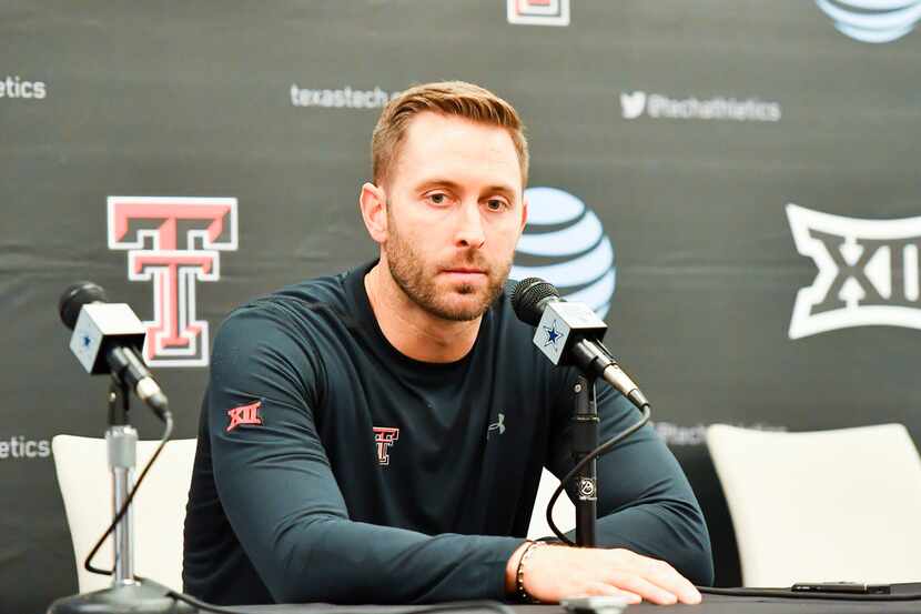 LUBBOCK, TX - NOVEMBER 24: Head coach Kliff Kingsbury of the Texas Tech Red Raiders answers...