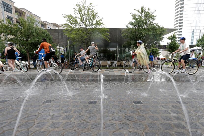 Cyclist depart Klyde Warren Park for the Katy Trail during Uptown Ciclovia, a spanish term...