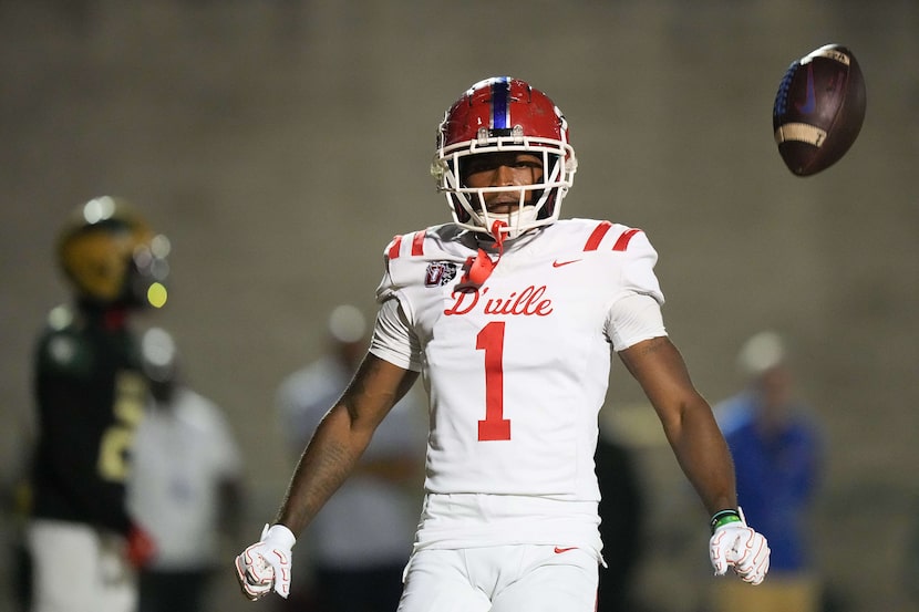 Duncanville wide receiver Dakorien Moore (1) celebrates after scoring on a 66-yard touchdown...