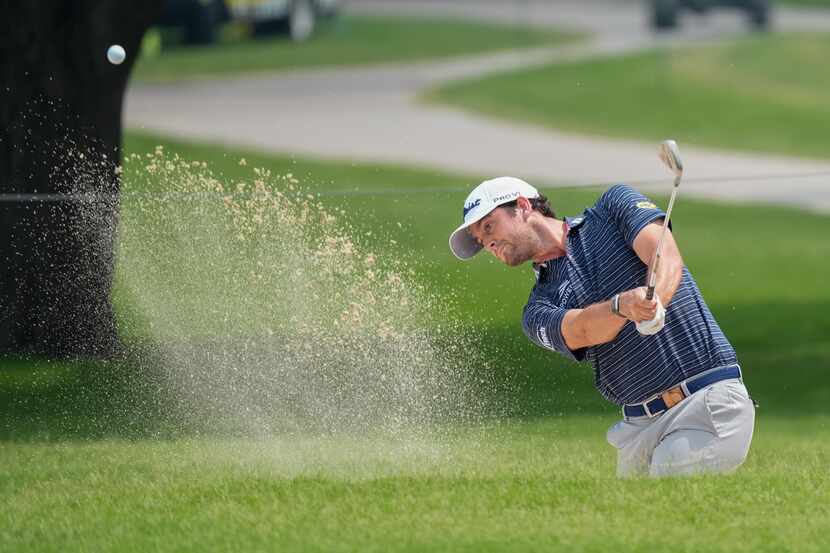 Davis Riley hits out of a trap on the second hole during the second round of the Charles...