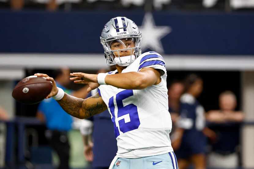 Dallas Cowboys quarterback Trey Lance warms up before an NFL football game against the New...