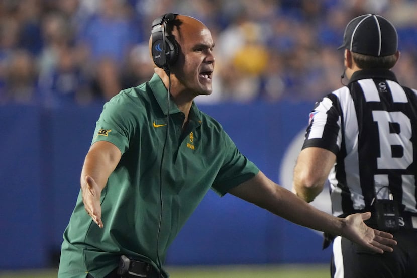 Baylor head coach Dave Aranda yells at an official in the first half, during an NCAA college...