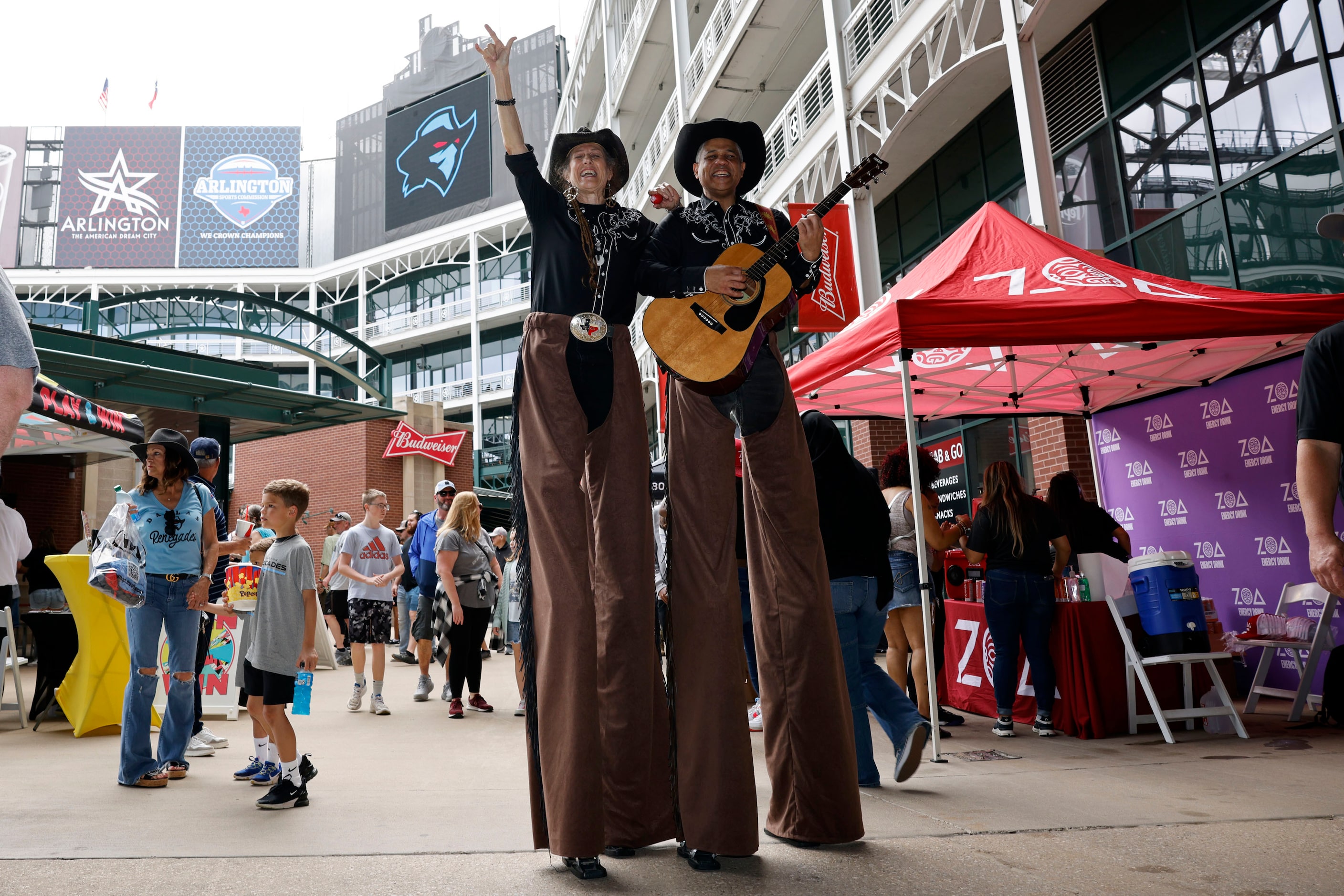 Rita Joye Gray and Kristian Craige of Clowning Around perform before the 2024 UFL season...