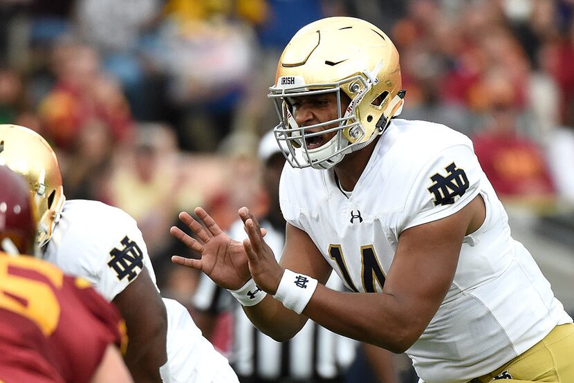 LOS ANGELES, CA - NOVEMBER 26:  DeShone Kizer #14 of the Notre Dame Fighting Irish prepares...