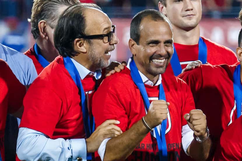 Fernando Clavijo (left) and Oscar Pareja celebrate after FC Dallas wins he 2016 US Open Cup.