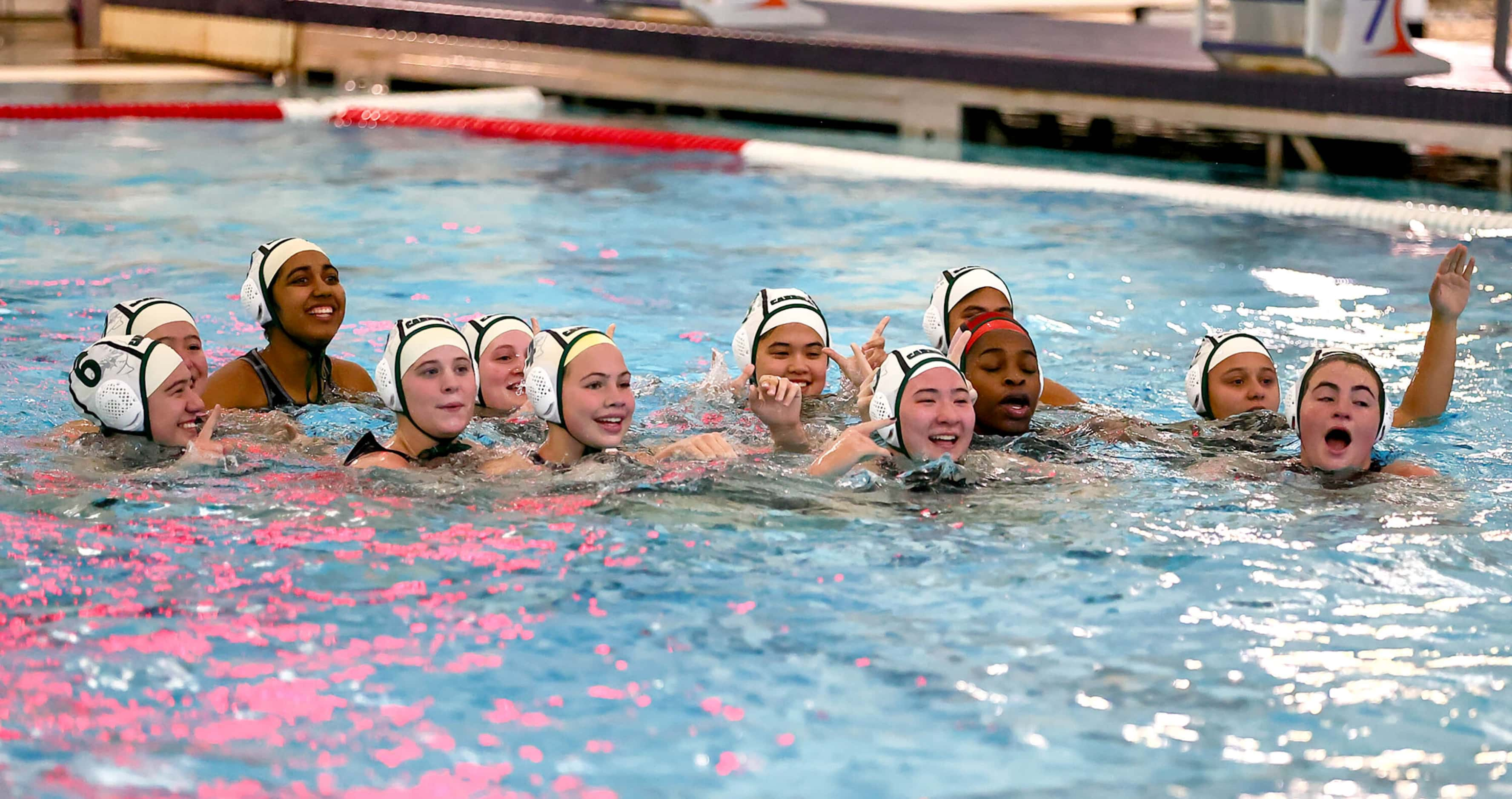 Southlake Carroll celebrate their victory over Hebron, 11-4 in the 6A Region I girls water...