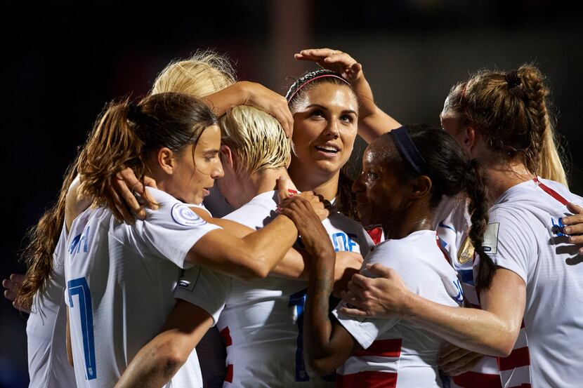 FRISCO, TX - OCTOBER 14:  Alex Morgan #13 of the United States celebrates after scoring a...