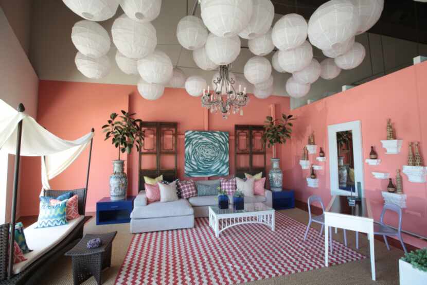 Laura Lee Clark's coral setting gets a boost of drama from the paper lantern collection,...
