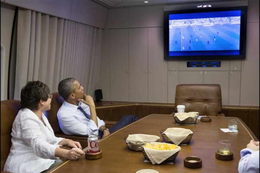 Aboard Air Force One on Thursday, President Barack Obama checked in on the game between the...
